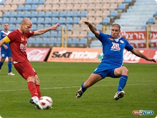 בטוח ירצה לשכוח את המשחק, וולק (בכחול) (באדיבות וואלה)